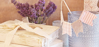 Shabby Chic Still Life With Old Books, Lavender, And Fabric Pennants