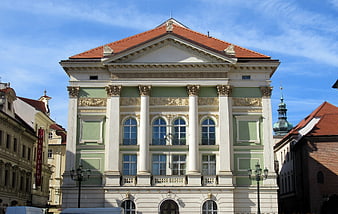 Classical Green and White Building Facade in Prague