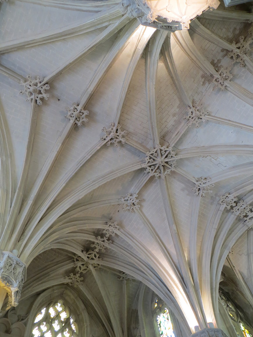 Gothic vaulted ceiling with intricate stone ribs and bosses