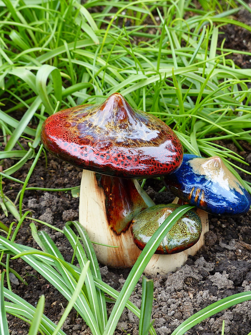 Colorful Ceramic Mushroom Garden Decor in Green Grass