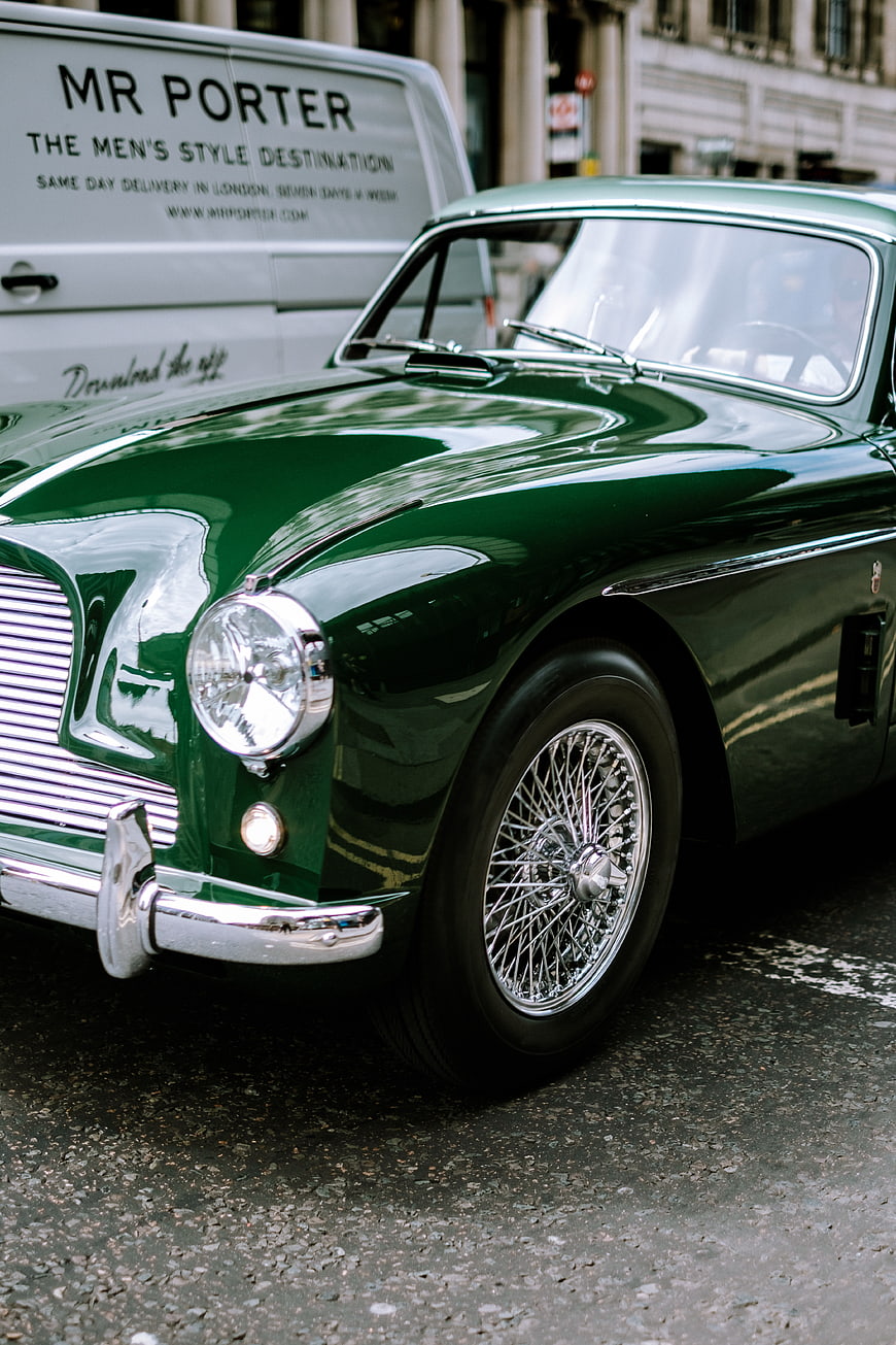 Classic Green Aston Martin DB4 on London Street