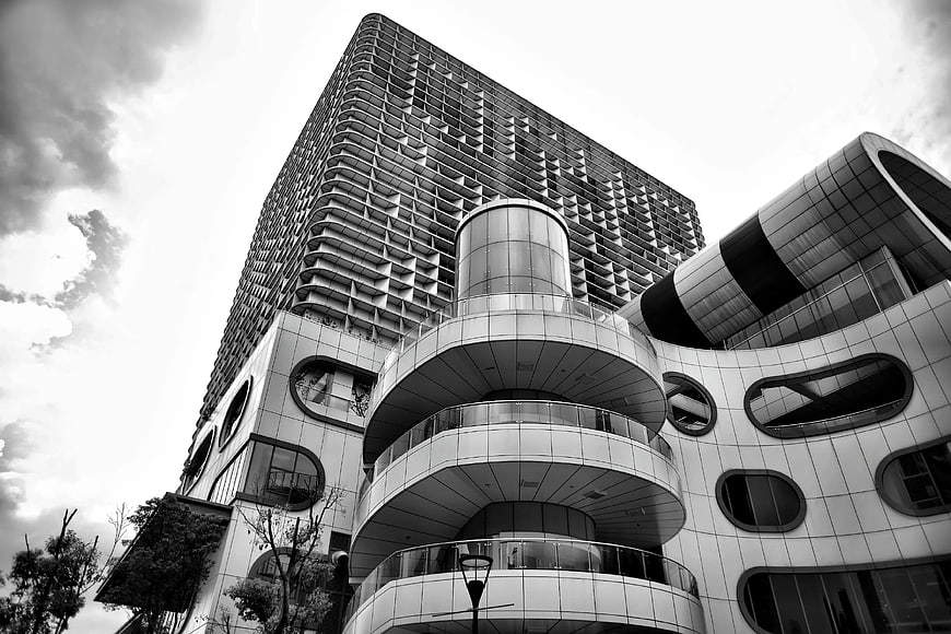 Black and white modern architecture with curved balconies