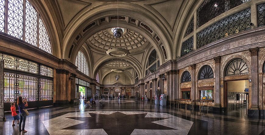 Grand Beaux-Arts Hall Interior with Arched Ceilings and Star Floor Pattern