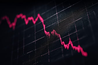 Red Stock Market Chart Showing Sharp Decline on Digital Screen