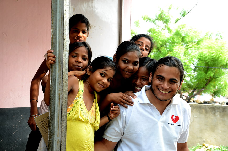 Volunteer and Children Group Portrait in India
