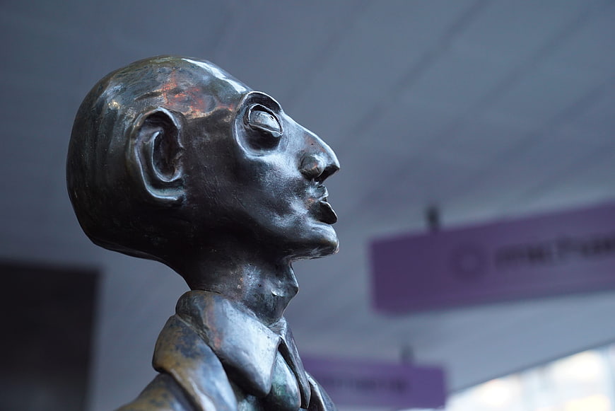 Close-up of bronze businessman sculpture head in profile