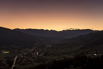 Twilight landscape of a village in the Allgäu Alps