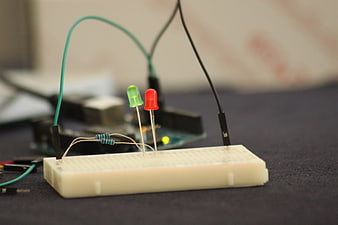 Close-up of electronic circuit with LEDs on breadboard