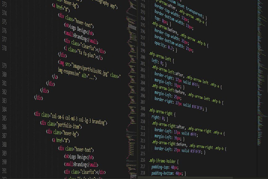 HTML and CSS code on dark screen