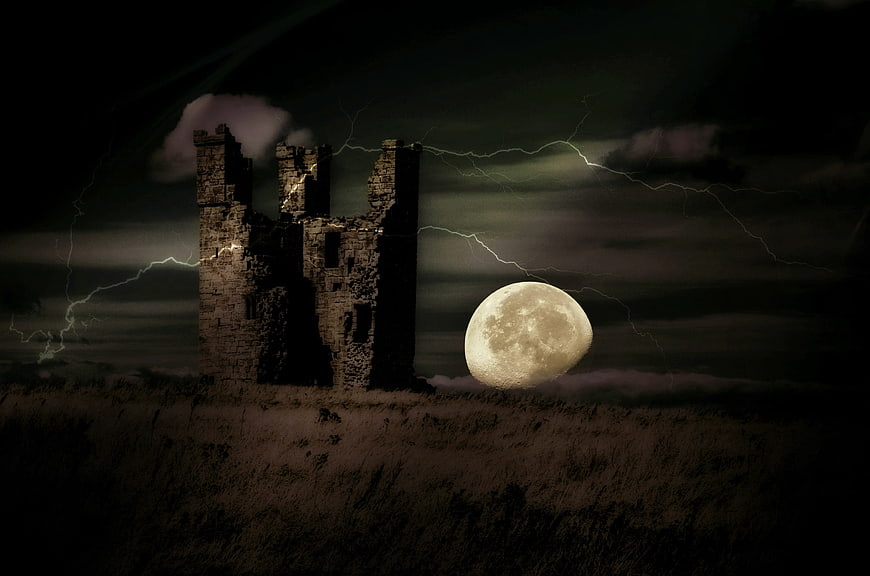 Spooky Castle Ruins with Lightning and Full Moon