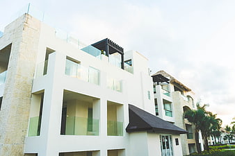 Modern White Resort Architecture with Glass Balconies