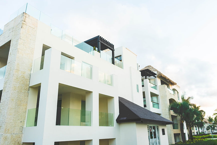 Modern White Resort Architecture with Glass Balconies