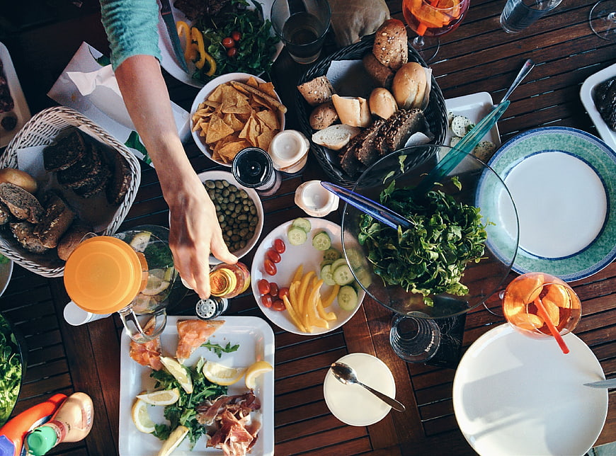 Top View Summer Barbecue Feast with Fresh Salad and Bread