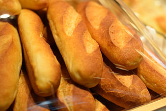 Golden Fresh Baguettes In Bakery Display Case