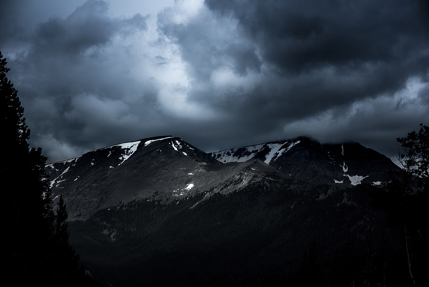 Dramatic Dark Mountain Landscape with Stormy Clouds