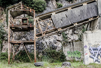 Abandoned Rusty Industrial Structure with Graffiti