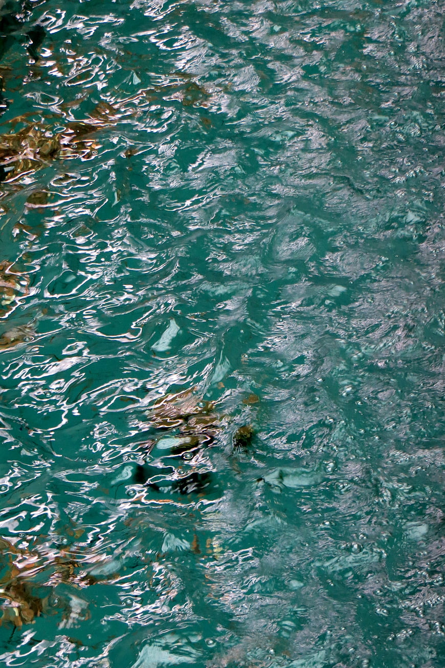Close-up of rippling turquoise water texture