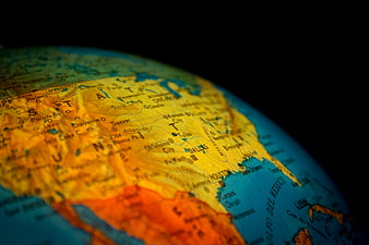 Close-up of a globe showing North America with shallow depth of field