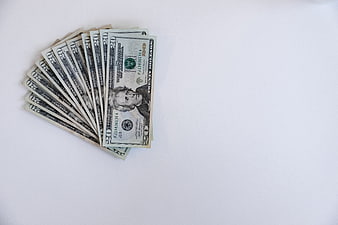 Fan of Twenty Dollar Bills on White Background