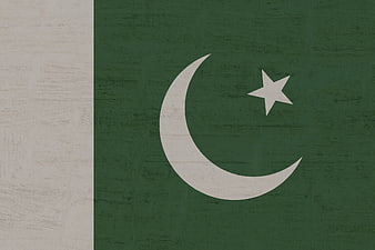 Textured Pakistan Flag on Weathered Green Background
