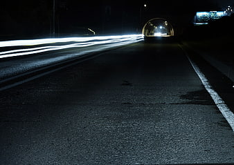 Long Exposure Night Highway with Light Trails and Tunnel