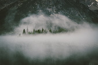 Misty Mountain Lake with Foggy Forest Reflection