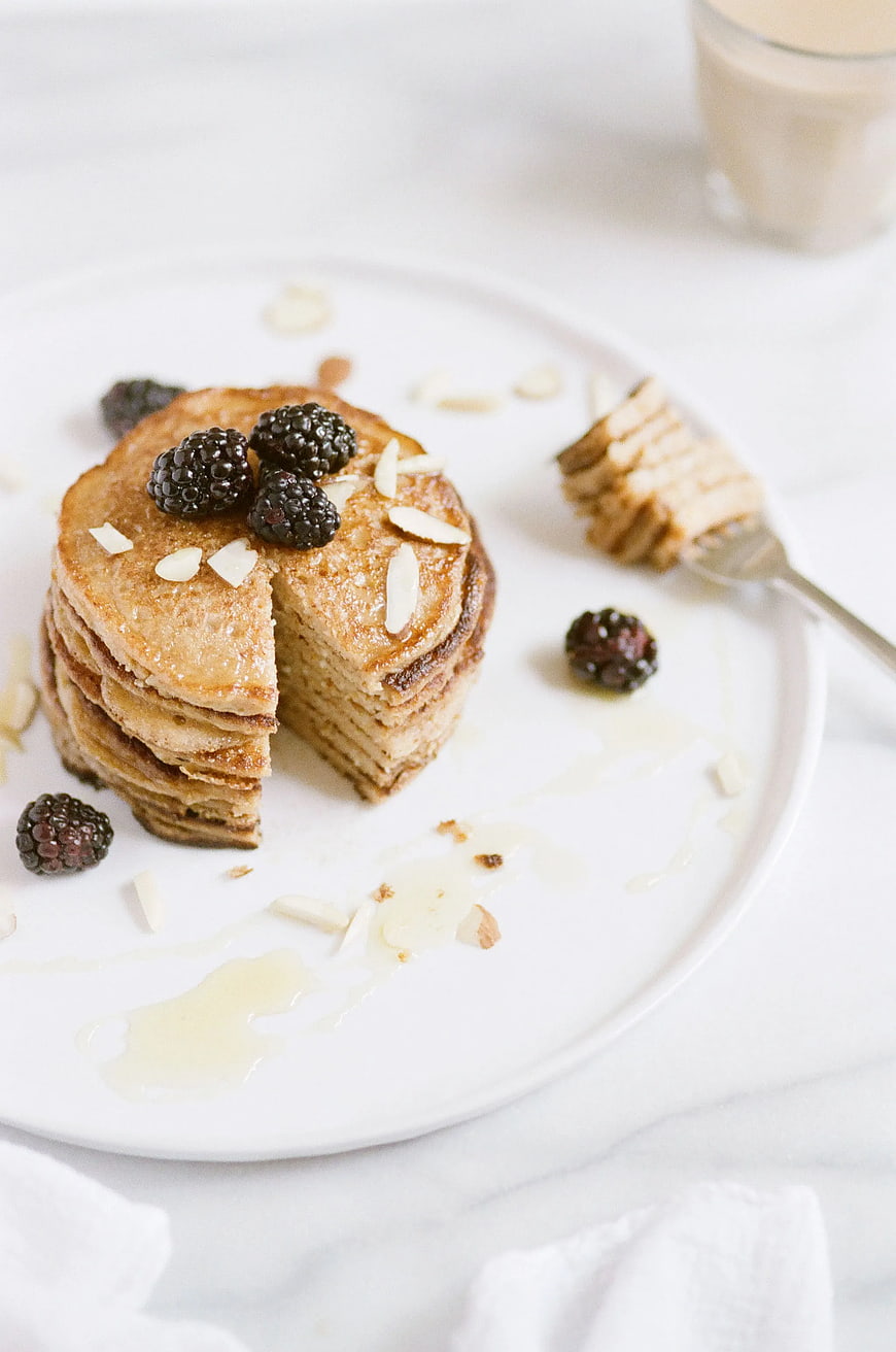 Stack of Golden Pancakes with Blackberries and Almonds