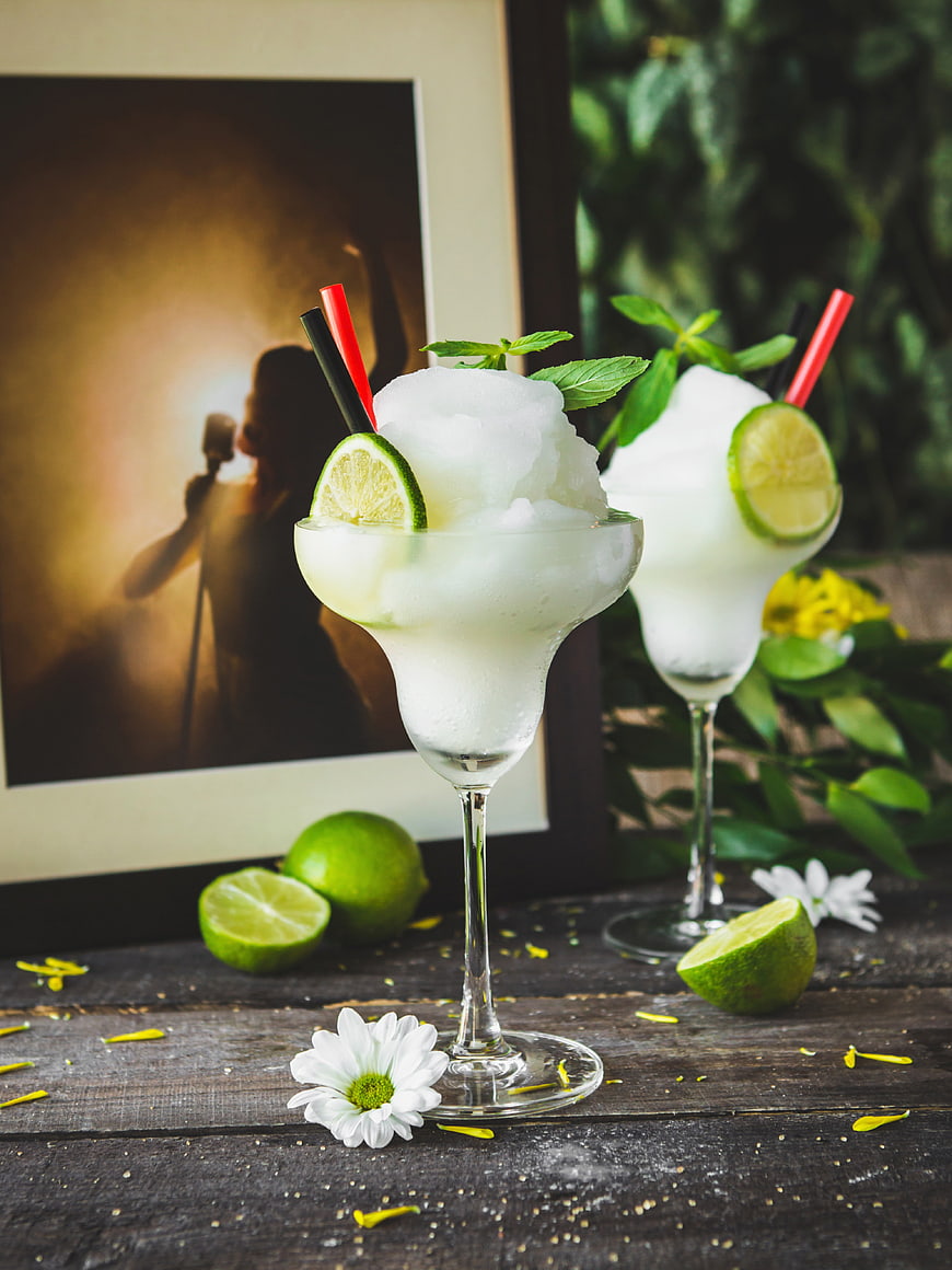 Fresh Frozen Lime Margaritas on Rustic Wooden Table