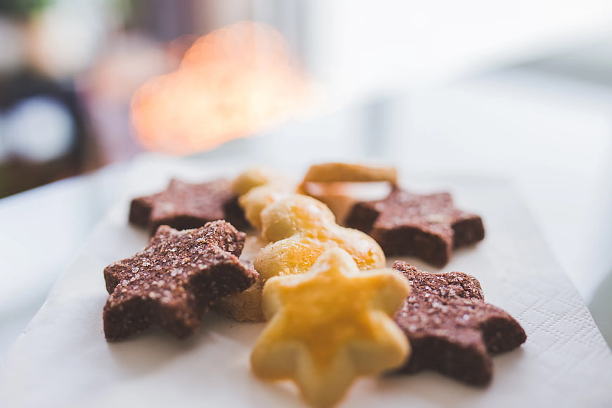 Star-shaped cookies on white napkin with bokeh background