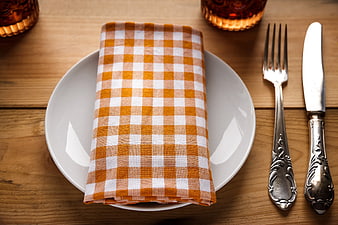 Rustic Table Setting with Orange Checkered Napkin