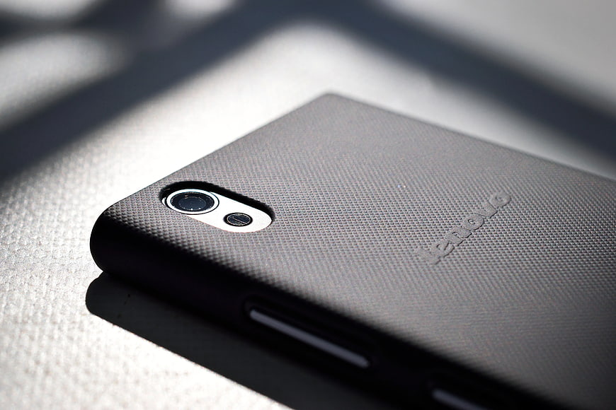 Close-up of Black Lenovo Smartphone with Textured Back