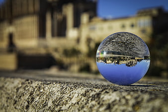 Crystal Ball Inverting Coastal Town Reflection
