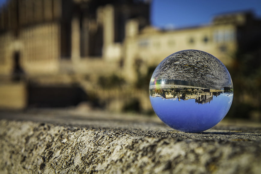 Crystal Ball Inverting Coastal Town Reflection