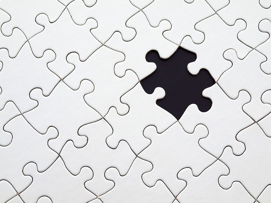 White Jigsaw Puzzle with Missing Piece Concept