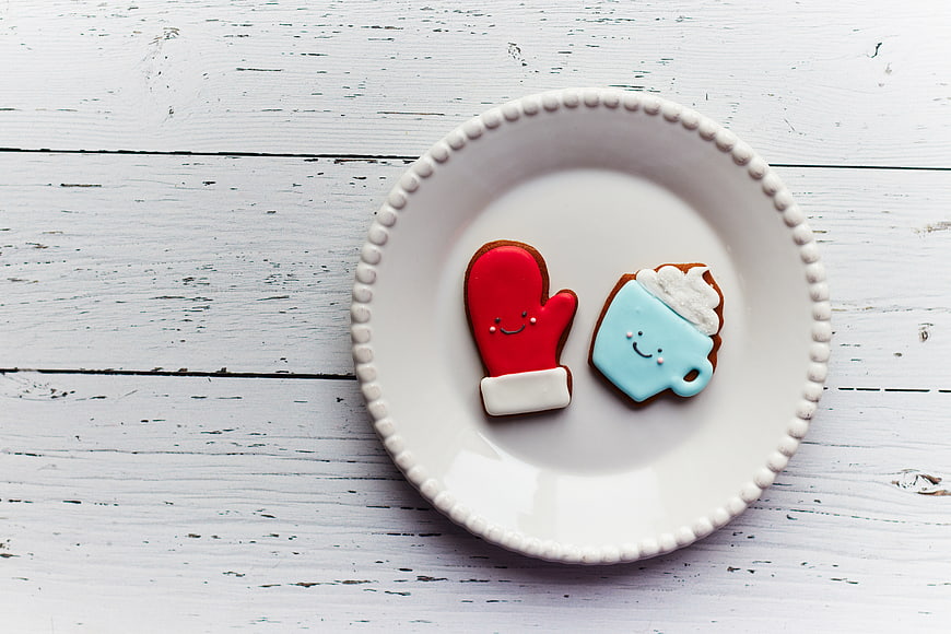 Cute Christmas Cookies on White Plate with Copyspace