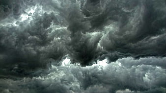 Dramatic dark storm clouds with turbulent sky texture