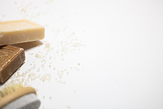 Natural Soap Bars and Bath Salts on White Background