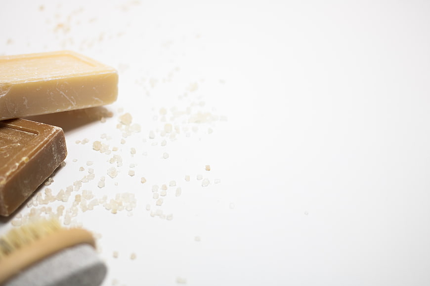 Natural Soap Bars and Bath Salts on White Background