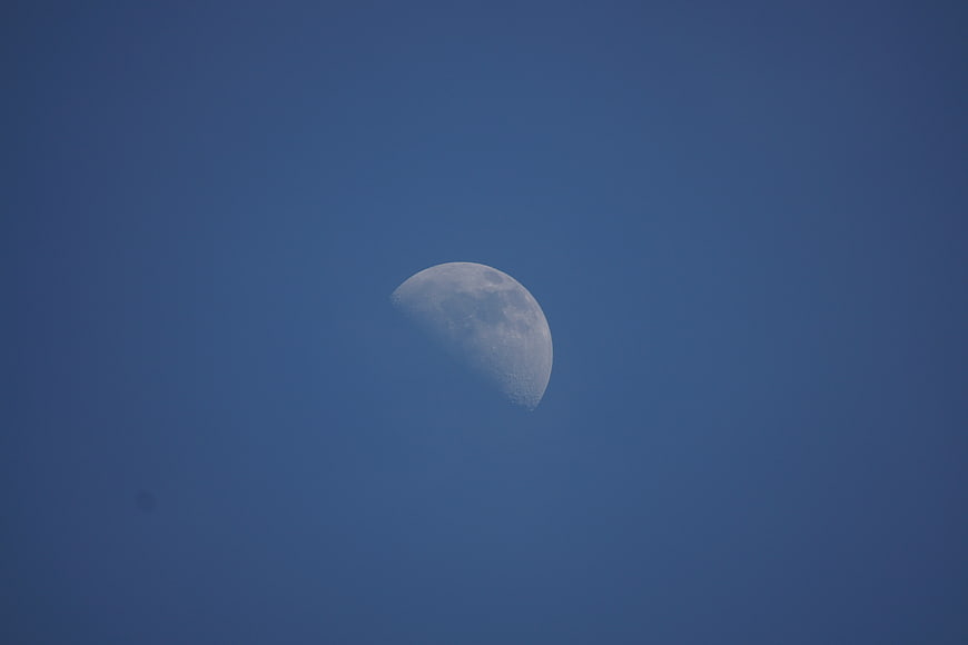 Half Moon in Blue Sky