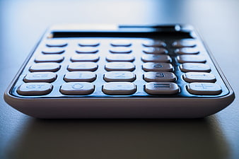 Close-up of office calculator on desk
