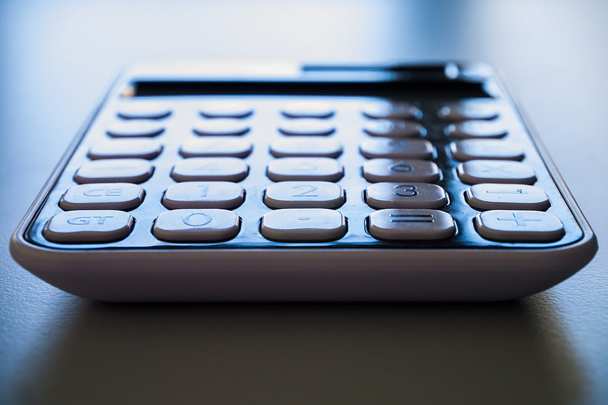 Close-up of office calculator on desk