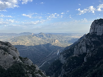 Scenic mountain landscape with rocky cliffs and valley view