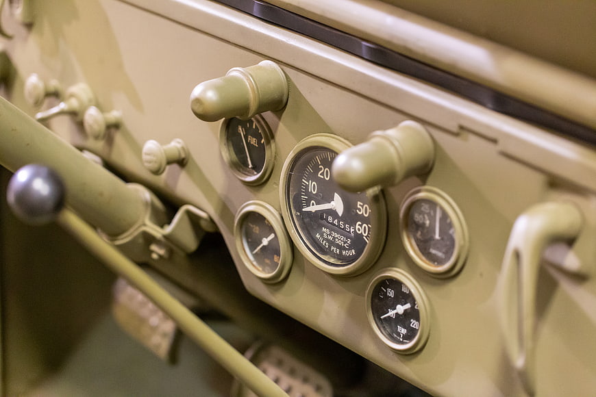 Vintage Military Vehicle Dashboard with Speedometer and Gauges