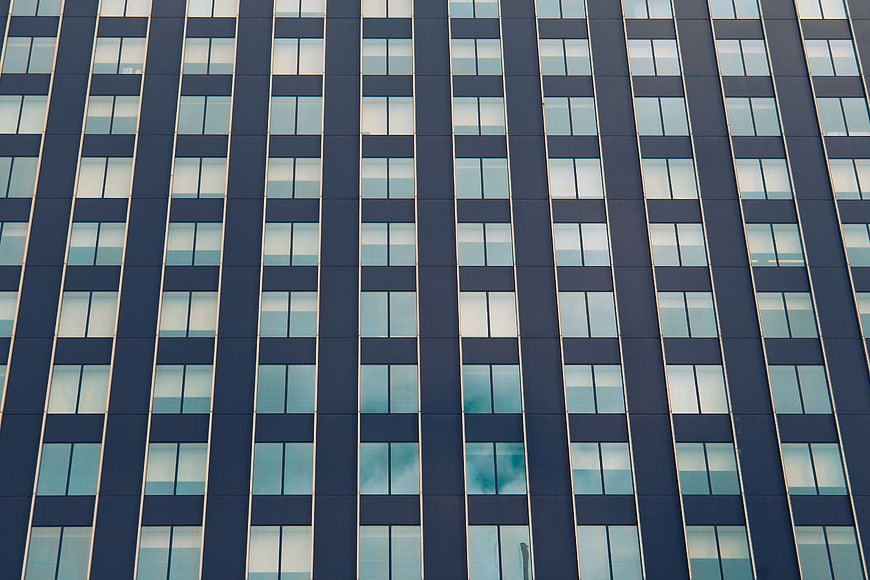 Modern Office Building Facade with Blue Glass Windows
