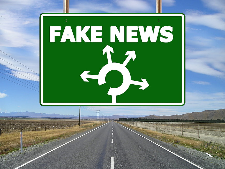 Fake News Highway Sign Concept On Rural Road