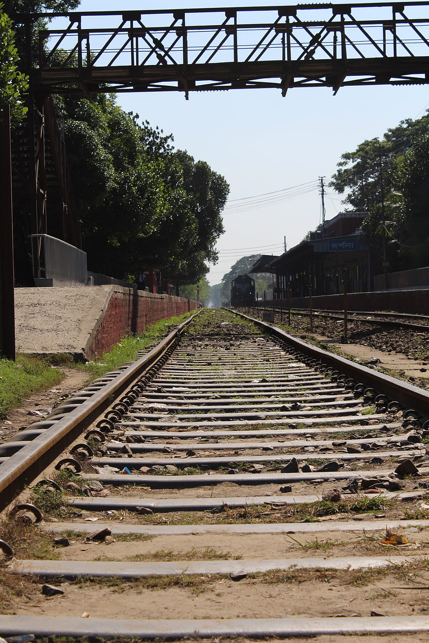 Low angle view of railway tracks leading to a train station