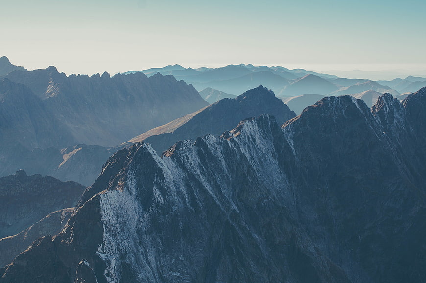 Majestic Snow-Capped Mountain Peaks at Sunrise