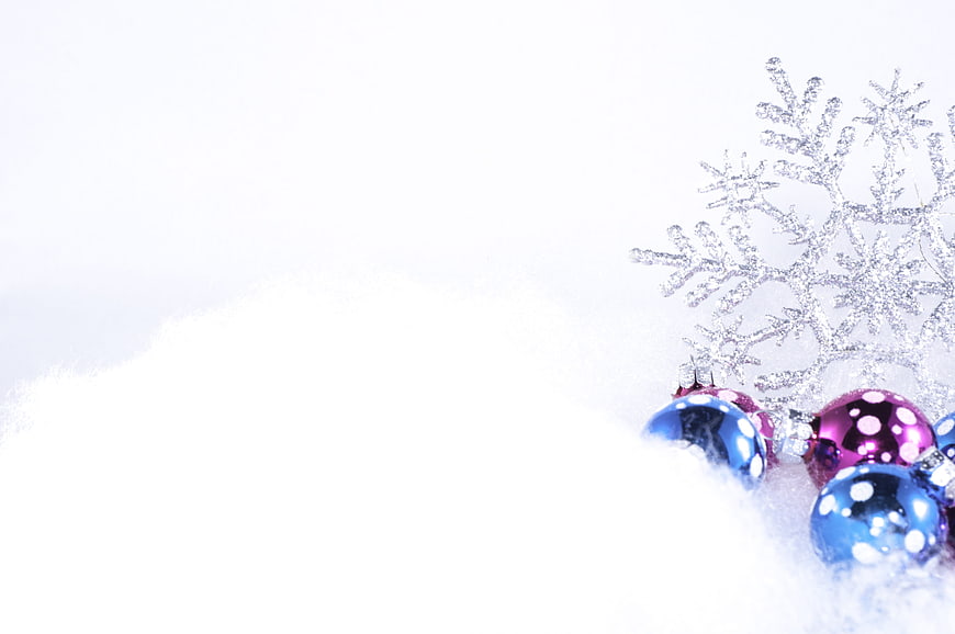 Blue and Pink Christmas Ornaments in Snow with Silver Snowflake