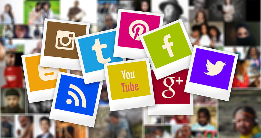 Social media icons collage on polaroid frames with blurred background
