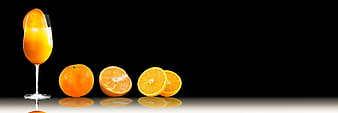 Fresh Orange Juice and Oranges on Black Background